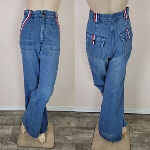 Vintage 1970s wrangler jeans, wide leg/flare. Red, white and blue striped trim